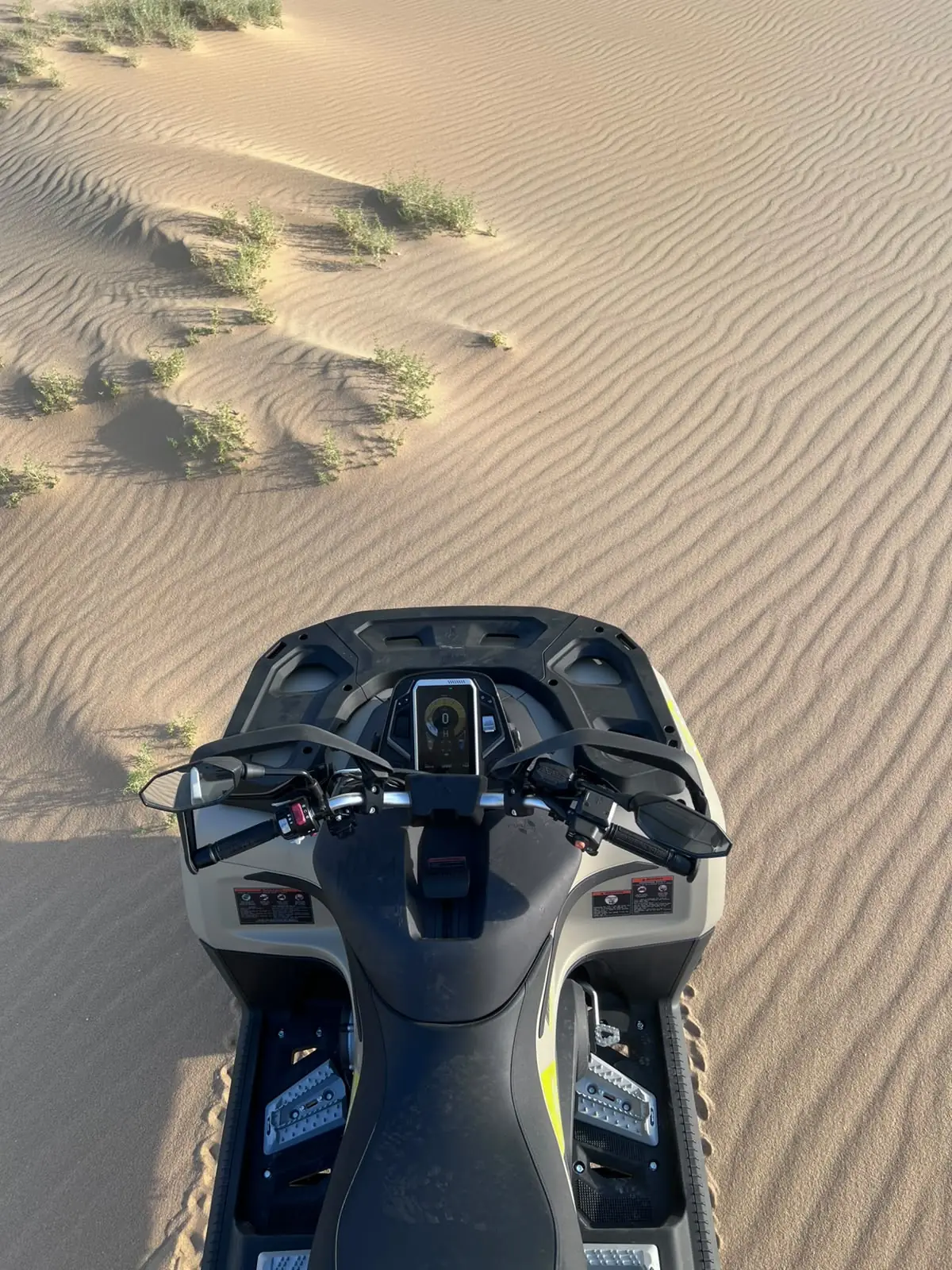 Rider's view of the Benda Redstone handlebars and display over sand