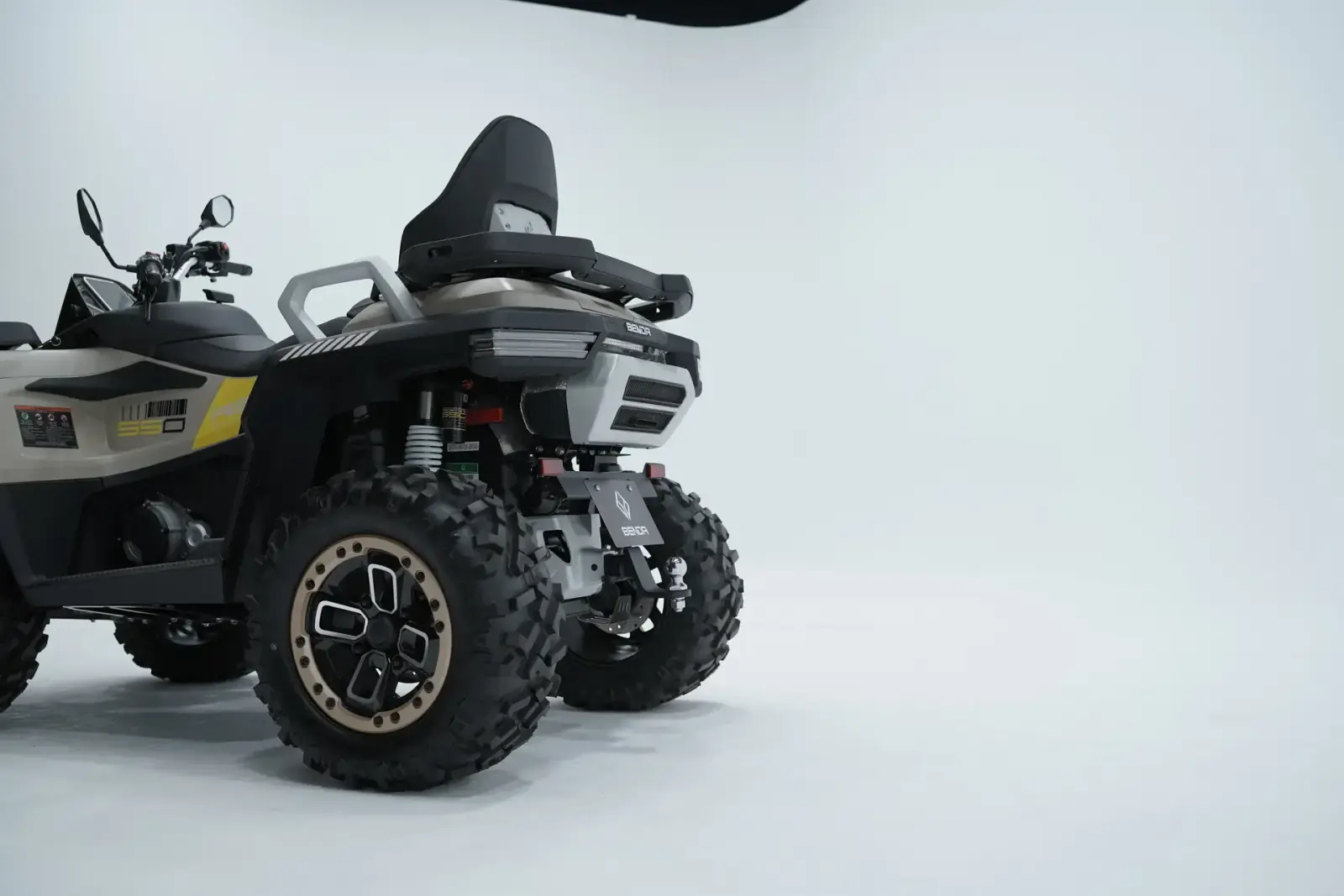 Benda ATV alongside a vehicle in studio